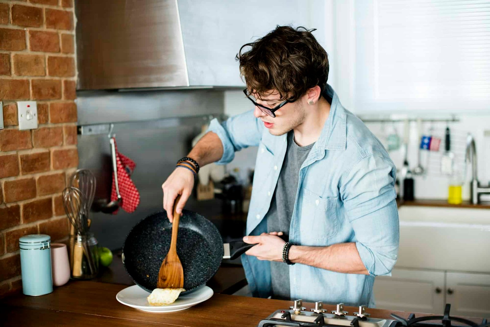 Caucasian man cooking in the kitchen
