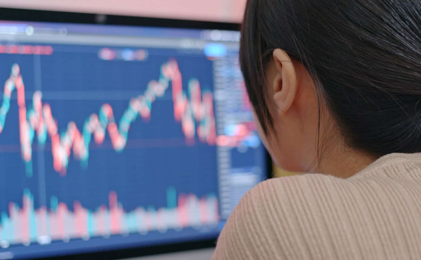 Woman study the stock market data