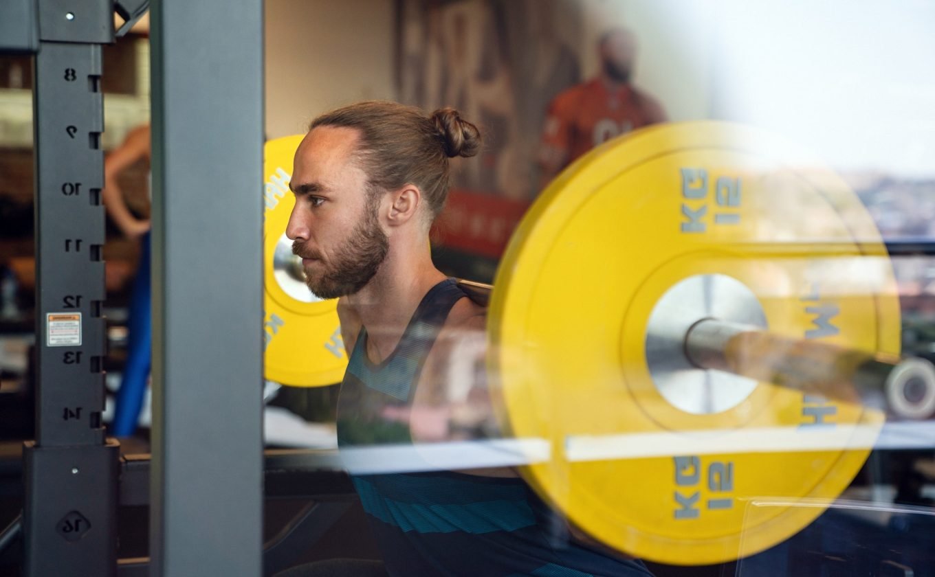 young-muscular-man-during-workout-in-the-gym.jpg